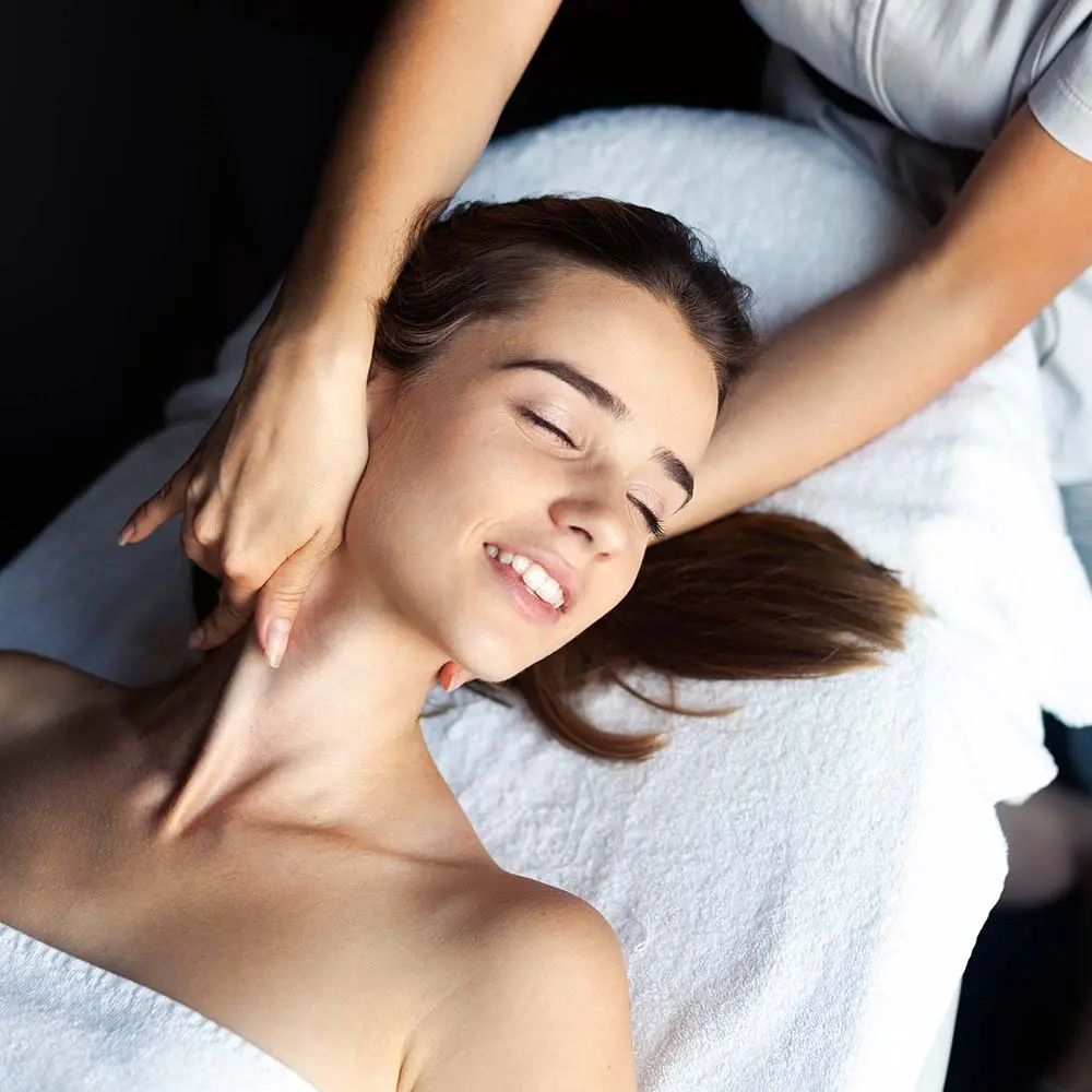 Home 17 Masseur doing massage on female body in the spa